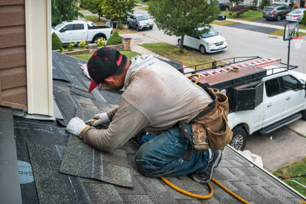 Professional Roofing technician working in Elmwood Park, NJ